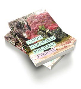 Japan Planned, Packed, Primed books stacked haphazardly